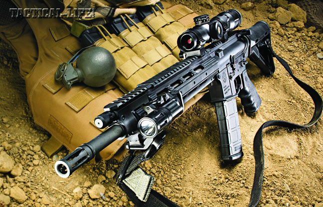 The Ruger SR-556 Carbine is a light, sleek 5.56mm that would be a perfect addition to any patrol unit or SWAT team. Its adjustable gas piston system helps it run reliably in adverse conditions. Shown with a Magpul CTR stock, Inforce WML and Leupold VX-R Patrol 1.25-4x20mm scope.