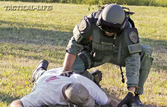 The Special Response Team trains hard to make arrests quickly and safely. Here an operator controls a downed suspect.