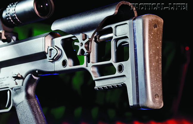 The skeletonized, folding stock locks over the bolt handle to keep it secure and reduce the MRAD’s width.