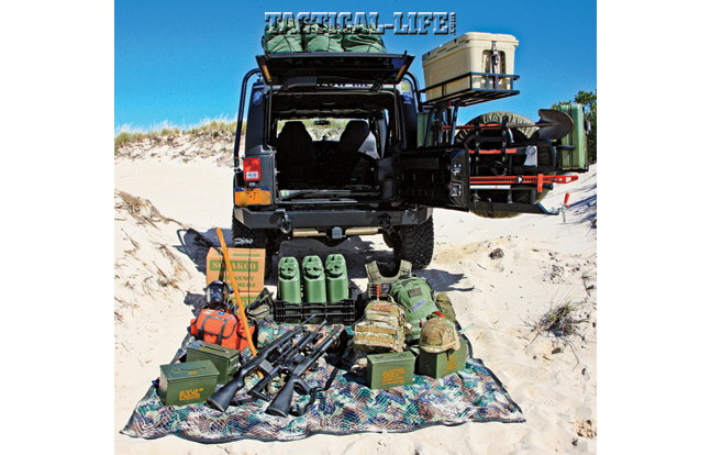 The Jeep’s bug-out kit includes fuel cans, food rations, ammo, several firearms, body armor, Kevlar helmets, assorted tools and much more.