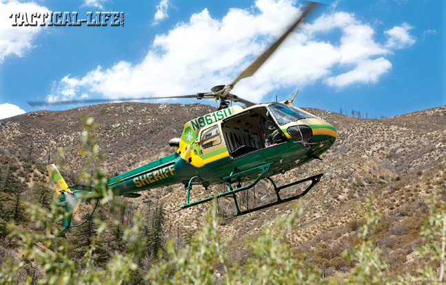 The Los Angeles County Sheriff’s Department’s Eurocopter maintained overwatch while the MET searched the illegal growing operation. Then the helo was used to airlift out the cut marijuana, hazardous chemicals and debris.