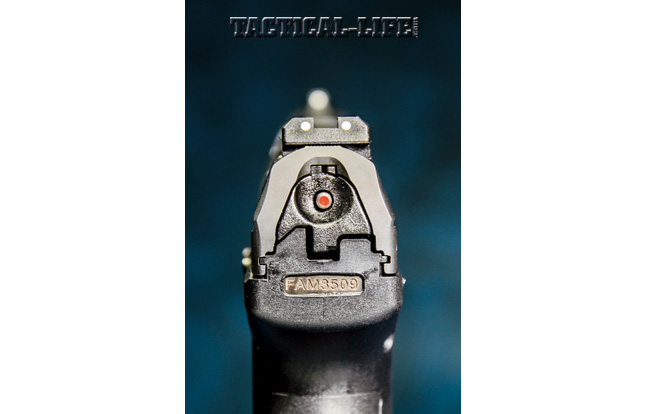 The P99’s red loaded-chamber indicator may be readily seen or felt in the dark. Also note the white-dot front and rear sights, which are very easy to acquire.