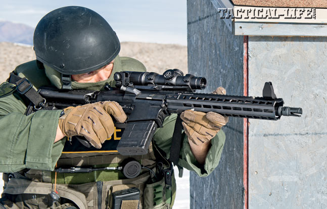 At the range, the author transitions to his Dueck Defense RTS iron sights. The MK212 gives you an entry-ready package that can also reach out to 500 yards and beyond.