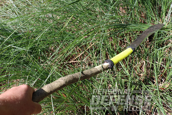 helm forge blades bush sword attached to stick