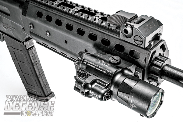 Accessory rail located on the right side of the handguard allows for the attachment of tactical lasers and lights, like the SureFire X-400 Ultra (shown).