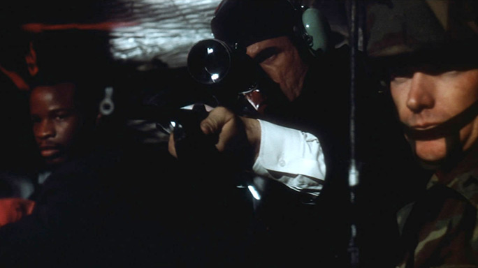 FBI Special Agent Johnson shoots his sniper rifle in Die Hard