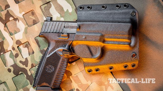 FN 509 pistol in holster