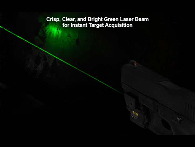 UTG Compact Ambidextrous Green Laser in darkness