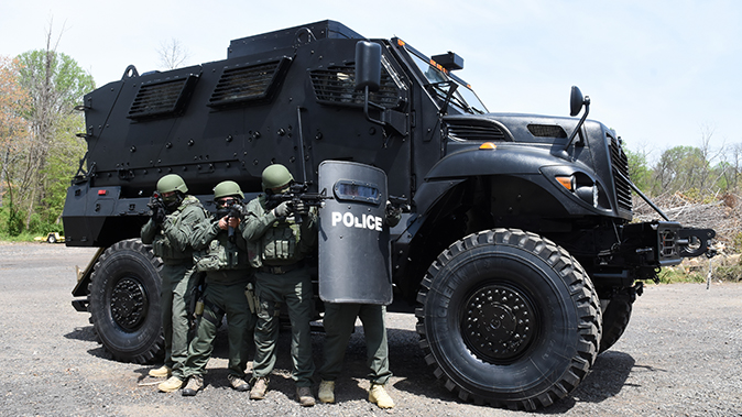 mrap vehicle police lined up