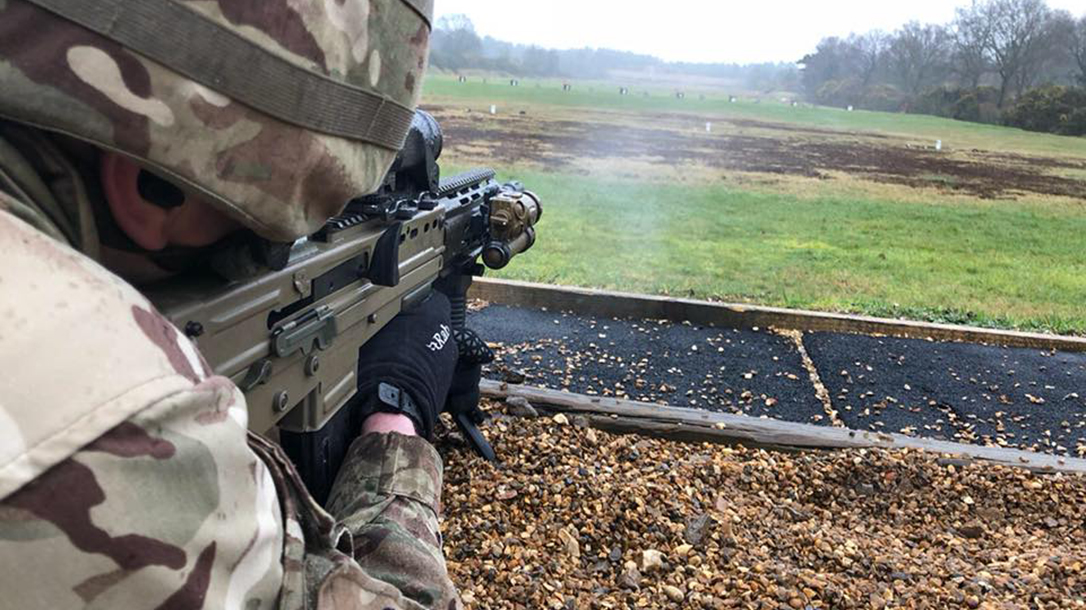 british army SA80A3 rifle shooting downrange