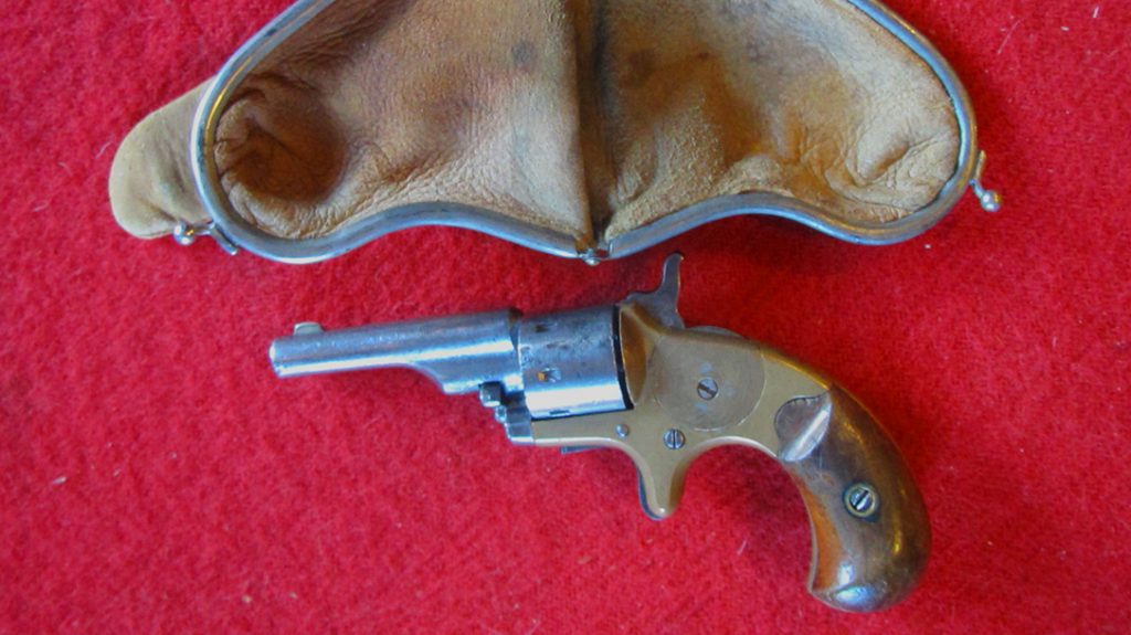 Woman's smart leather purses held old west guns such as this Colt Open Top Pocket Model