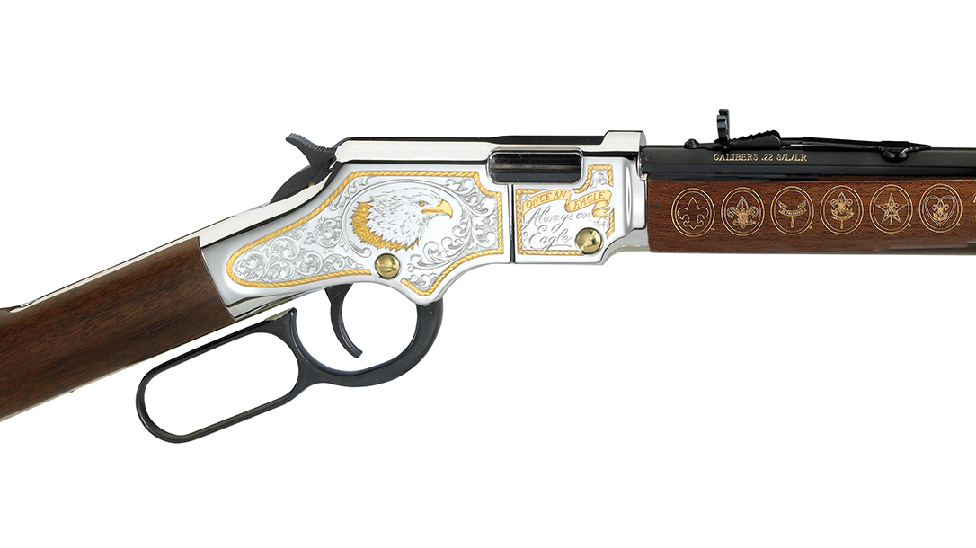 Fine scroll work and and engraving embellish the rifle.