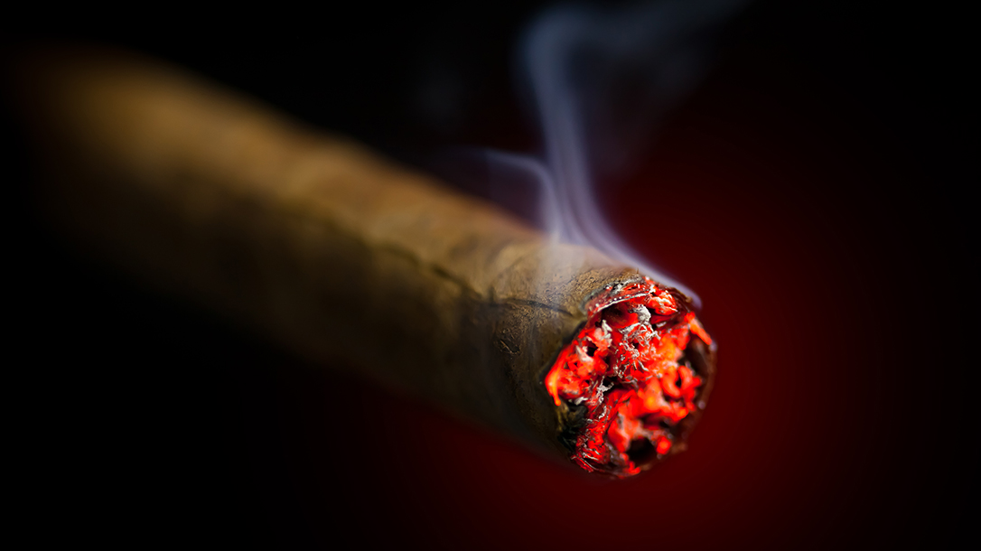 Burning a cigar is the perfect ending to a busy day.
