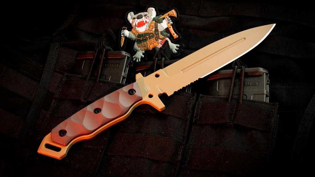 The 11.61-inch overall length of the MIK-01PS features a classic, spear point fighting knife style.