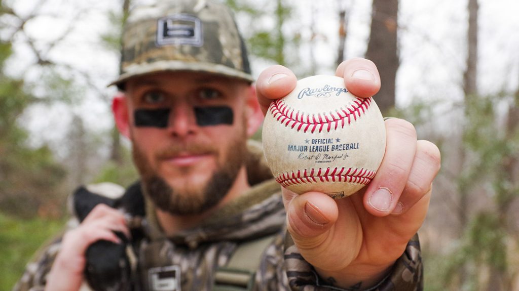 Brandon Snyder with two of his favorite things, a freshly harvested duck and an official MLB ball