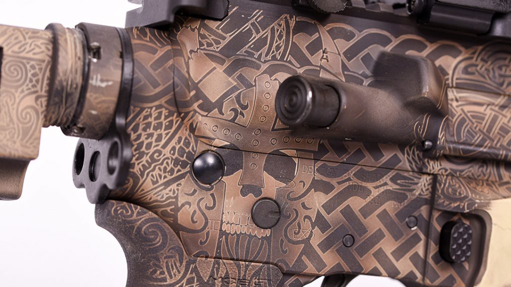 Attention to detail on the right side of the rifle is exquisite, from draug to knotwork.