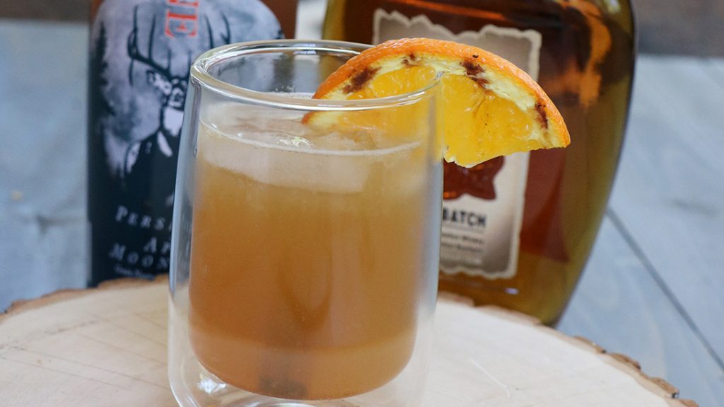 Add the libations to your wild game cookout with this smoked orange cocktail.