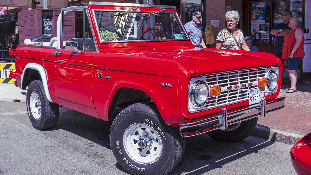 A classic Ford Bronco is a sight for sore eyes in a sea of compacts.