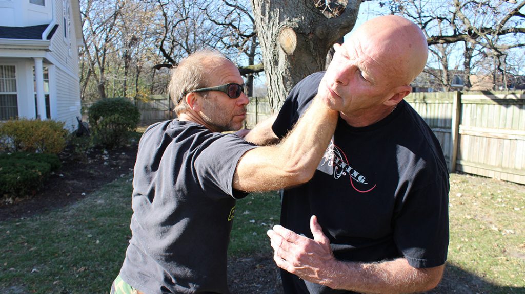 Immediately thrust your forearm into your attacker’s carotid artery on the side of his neck.