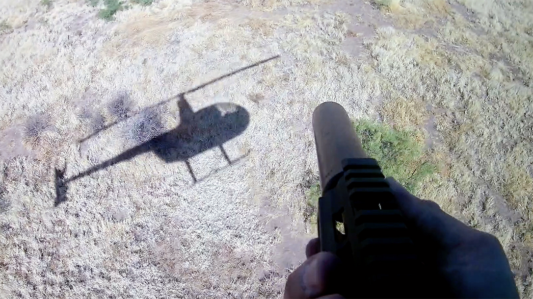 Hunting coyotes in Texas via helicopter with Trijicon.