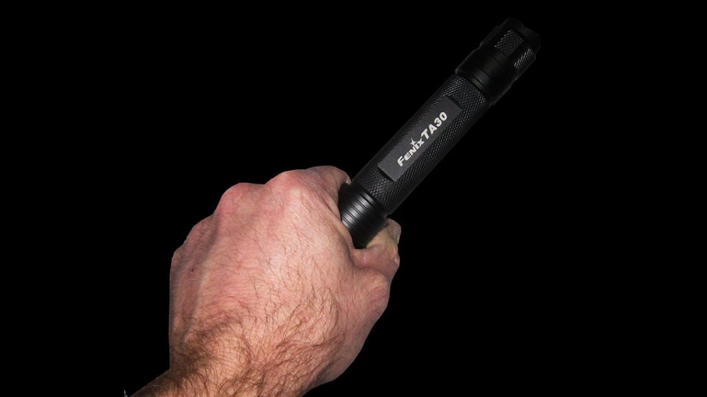 McCann suggests tactical lights without crenulations on the bezel, 8" length and of sufficient lumens to sharply diminish an attacker's night vision or vision.