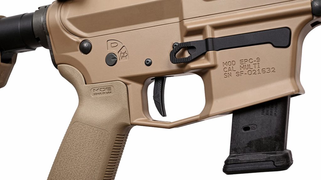 The FDE lower features a tapered magazine well for easy loading of Glock-pattern 9mm mags.