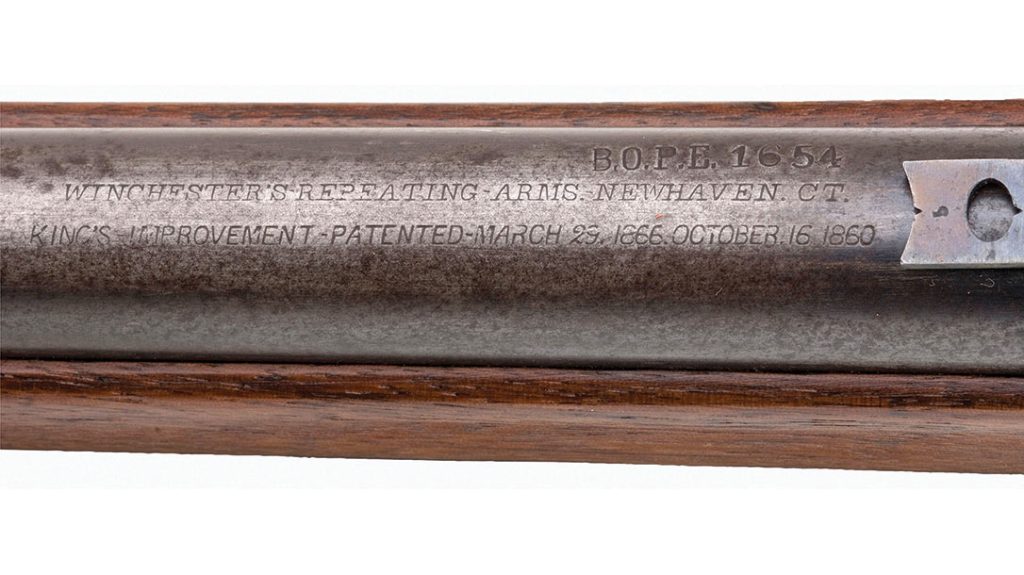 The barrel of the Winchester Model 1866 Carbine features the model details.