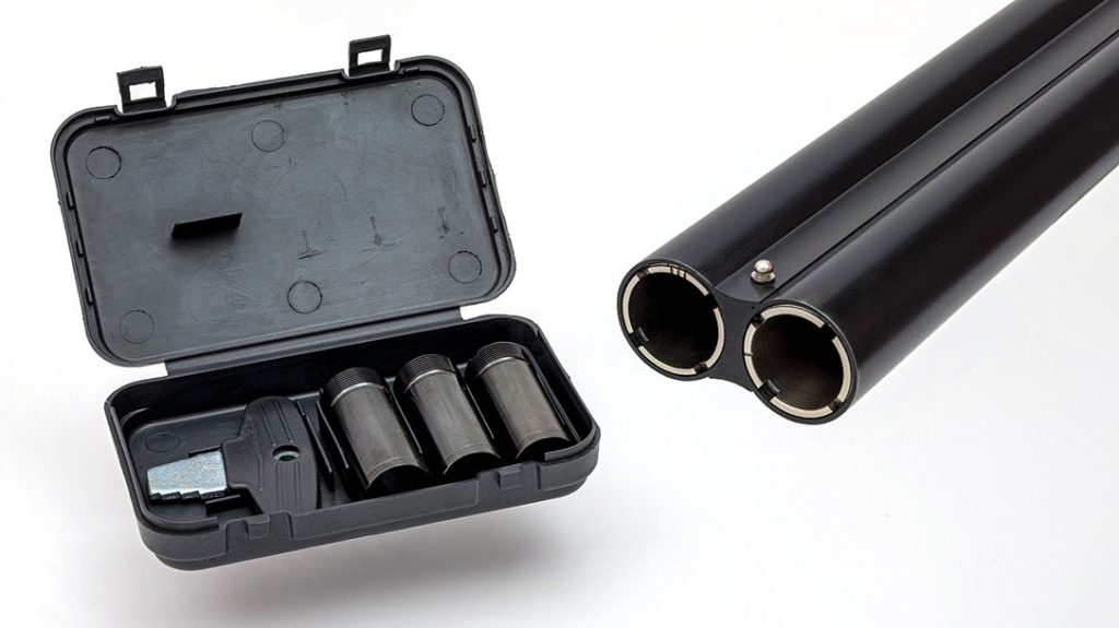 Five different choke tubes accompany the Navy Arms Coach Gun—three in a plastic case with a choke tube wrench. Small dashes on the tube indicate its choke setting.
