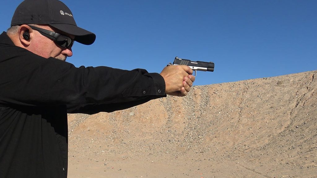 The author runs some drills with the 1911.