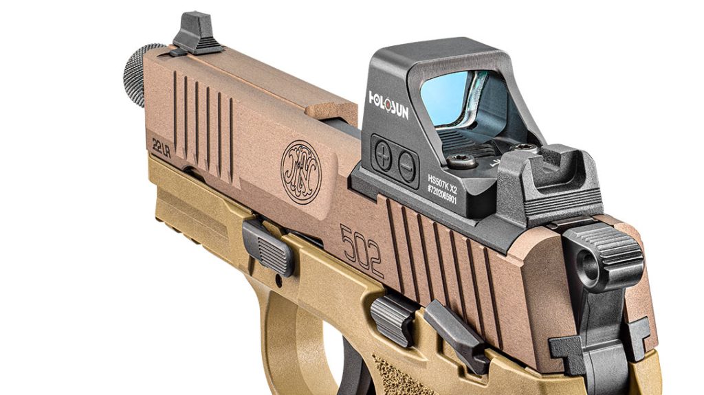 Unlike lesser .22 pistols, the FN 502 Tactical is cut to accept a red-dot optic straight from the factory. Sundry mounting plates come standard with the gun.
