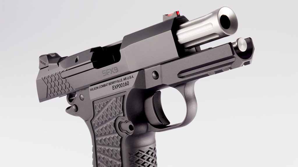 Wilson Combat flutes the SFX9's stainless barrel and gives the muzzle a concave crown.