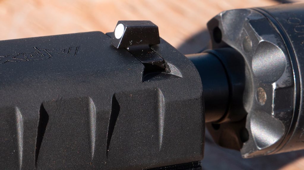 The threaded barrel allows for easily attaching a suppressor.