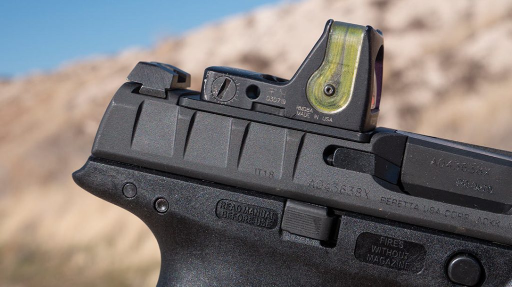 Trijicon’s Dual Illumination RMR with a 12.9-MOA Amber Triangle allowed me to index the sights if needed.