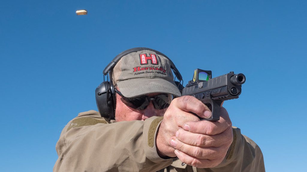 The author shooting the Beretta APX Combat.