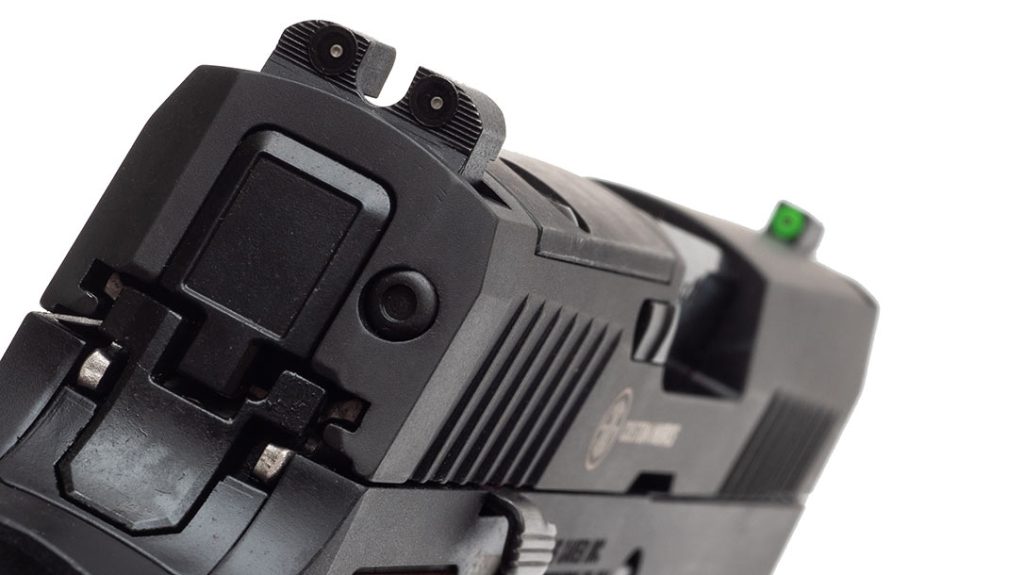 The Sig Sauer P320 AXG Classic’s rear sight is serrated and integrates tritium inserts for easy slight alignment in low light.