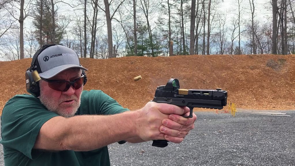 The author shooting the Sig Sauer P320 Spectre Comp.