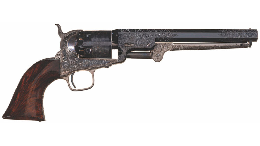 This Gustave Young-style, engraved 1851 Navy, with burl walnut stocks, is an example of a deluxe, middle-third model, London Colt Navy.