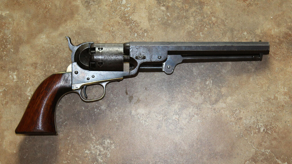 This late 3rd Model '51 (circa 1856) reveals the smaller rounded trigger guard. Likewise, we see the enlarged and beveled barrel lug loading cutout on the barrel assembly.