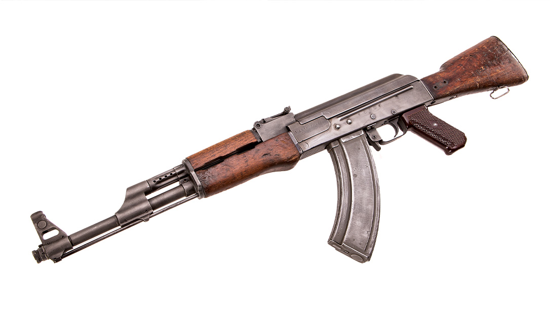 The AK-47 was designed for durability and reliability under harsh conditions, produced at a relatively low cost compared to other weapons, and is now considered one of the most readily available firearms in the world today.
