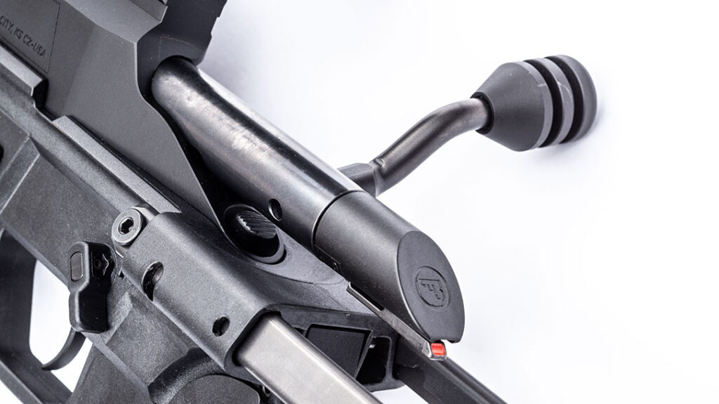 The rifle features a rugged yet simplistic three-lug bolt that is operated by an oversized, tactical-style handle.