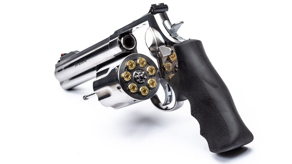 The pistol features rugged all stainless steel construction and a massive cylinder that holds seven cartridges.