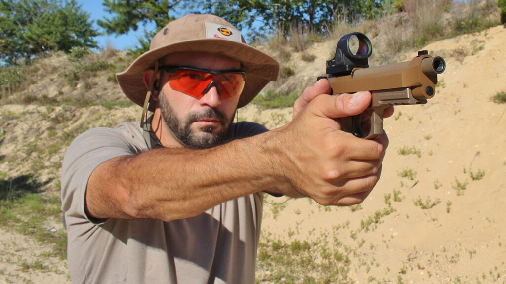 The author shooting the Beretta M9A4.