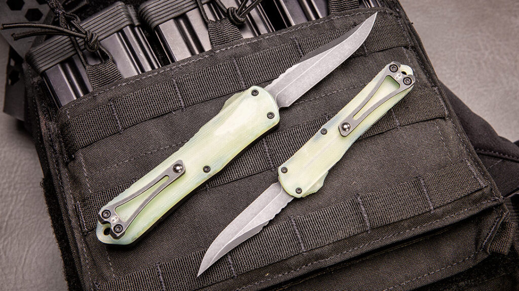 Two Heretic OTF Knives.