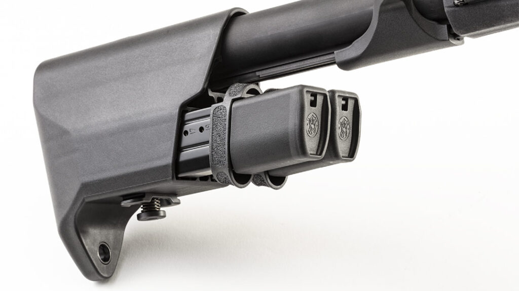 The buttstock has two magazine pouches for additional magazines.