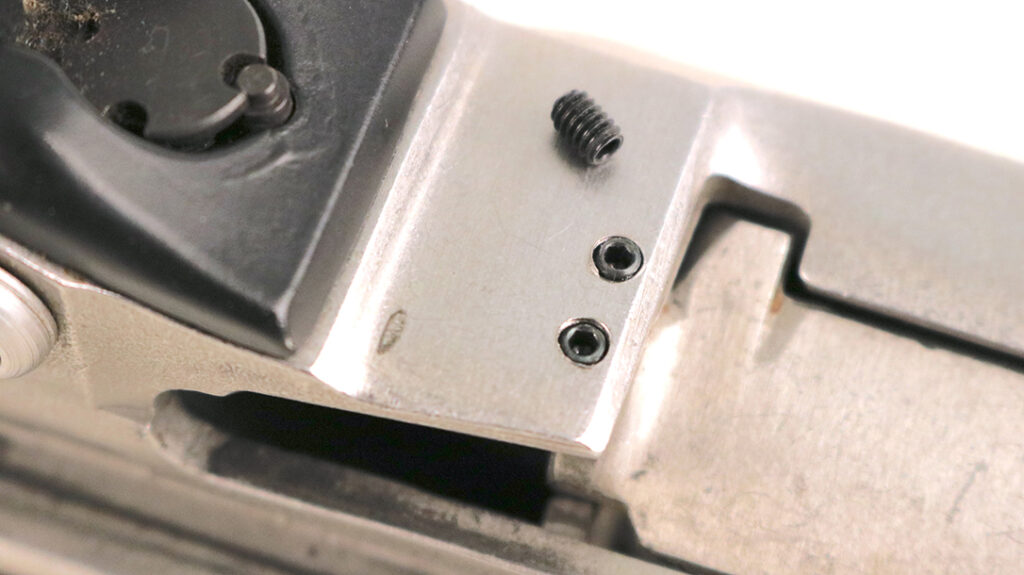 Some Philistine drilled and tapped the receiver on my Mini-14 host. This sacrilege knocked about $400 off of the purchase price. I was fine to simply fill in the holes with setscrews.