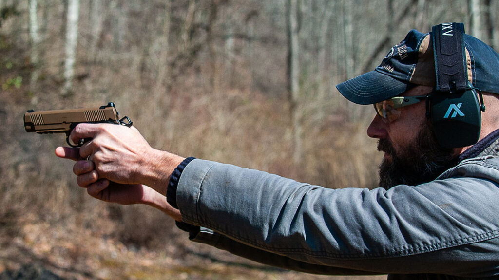 The author shooting the Springfield TRP Carry Contour.