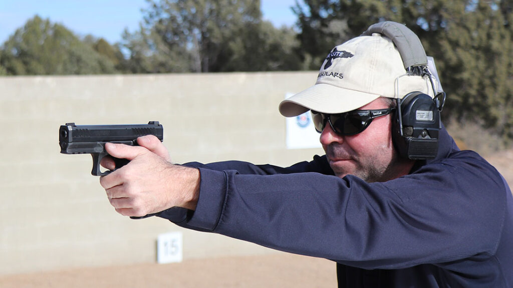 The author shooting the Taurus TS9 full-size pistol at Gunsite.