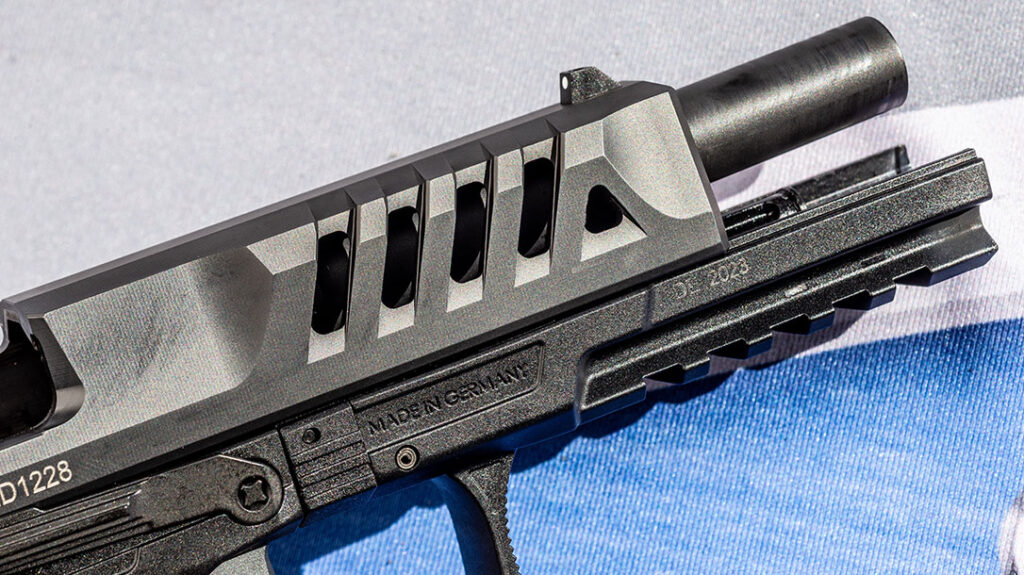 The slide has lightening cuts integrated into the cocking serrations.