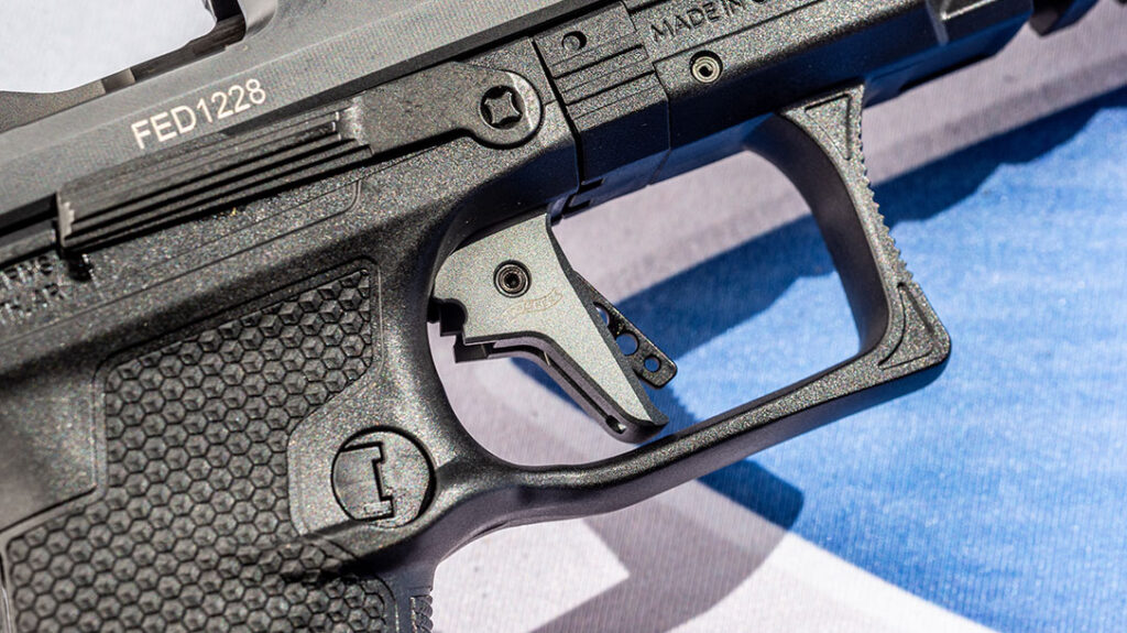 The Walther PDP Full-Size Match trigger’s flat face has more contact area, which made the pull feel lighter to me.