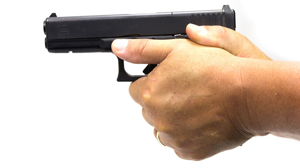 Pistol Shooting 101: Establish the proper grip.